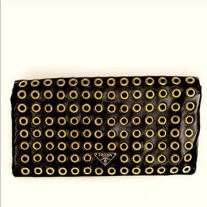 Prada leather grommet clutch